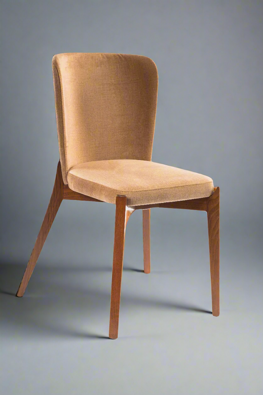 Cozy armchair with plush cushions and rolled arms