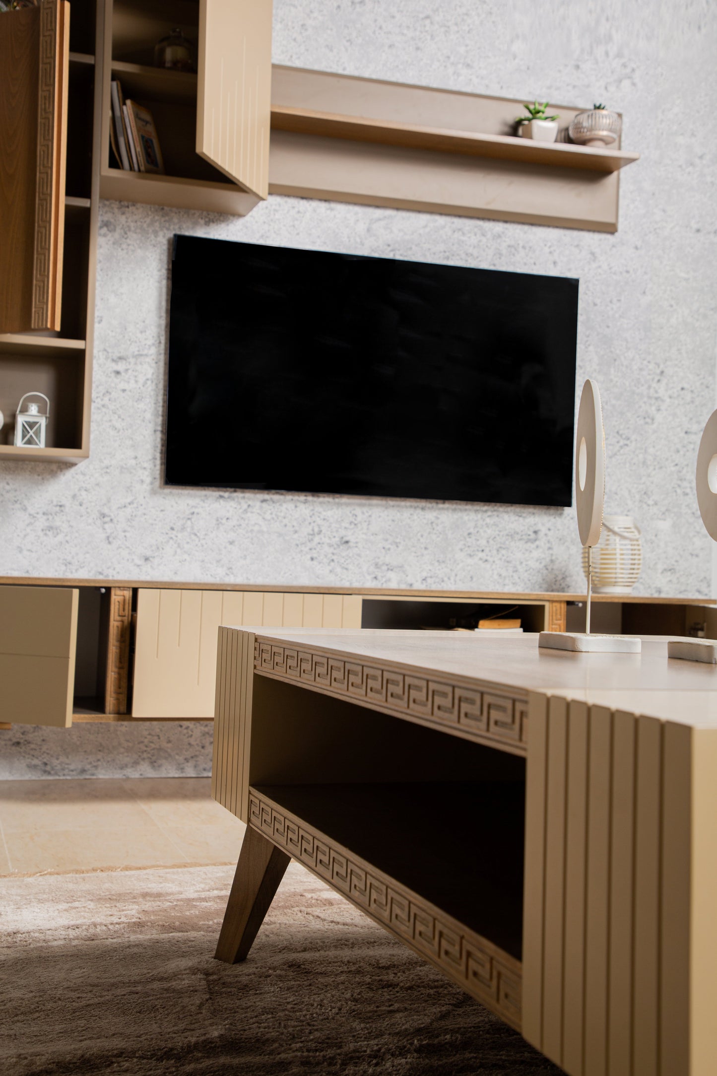 TV stand with floating shelves and cable management.